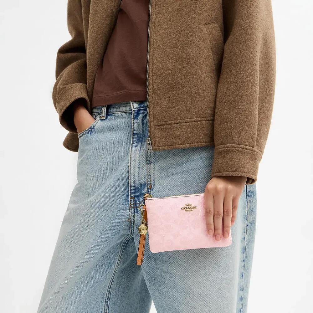 🩷NWT Pink Corner Zip Wristlet In Signature Canvas With Charm and Gold Hardware - Picture 4 of 8